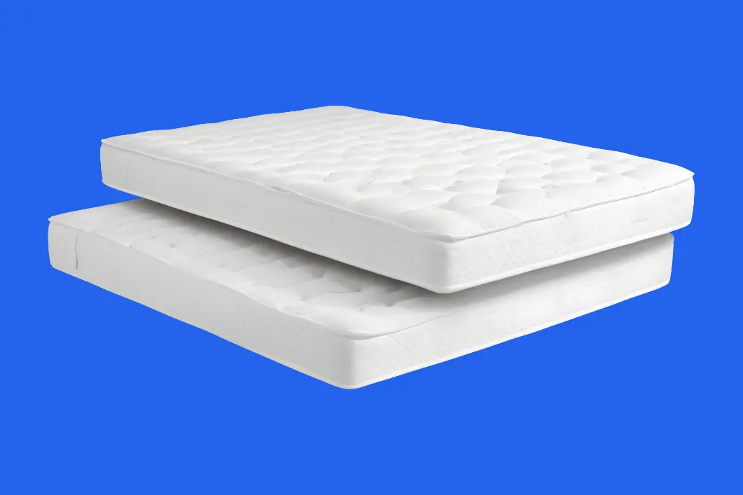 Mattresses stacked for collection